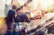 © alphaspirit - Team of workers reaches an agreement. Double exposure with light effect