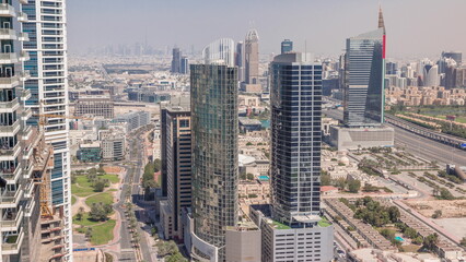  Aerial view of media city and al barsha heights district area all day timelapse from Dubai marina.