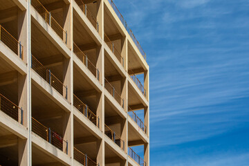 An engineered timber multi story green, sustainable residential high rise apartment building construction project showing teh wooden floors, ceilings and walls