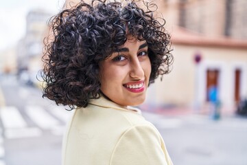 Sticker - Young middle east woman excutive smiling confident standing at street