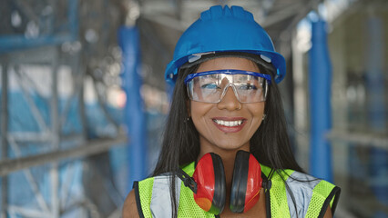 Wall Mural - African american woman builder smiling confident standing at street