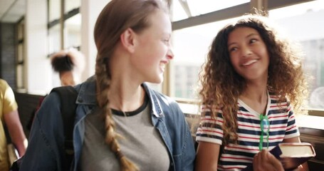 Sticker - Friendship, talking and students walking in the hallway together to bond or discuss academic work. Happy, diversity and teenage girl friends laughing and speaking in the corridor of their high school