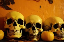 Halloween Pumpkins And A Skull Frame Are On The Mantelpiece, Next To The Yellow Wall. Generative AI