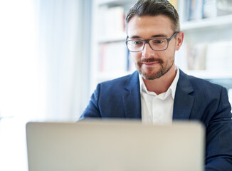 Canvas Print - Business, focus and man with a laptop for research, website information and reading email for project management. Mature entrepreneur at computer for planning online analysis, administration and tech