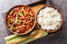 Rajma Masala Is A Popular North Indian Dish Made With Red Kidney Beans And Rice Close-up On A Wooden Tray On The Table. Horizontal Top View From Above