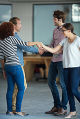 Handshake, success or business people in startup for collaboration, support or deal agreement. Group of men, happy women or team of creative employees shaking hands in a partnership or negotiation