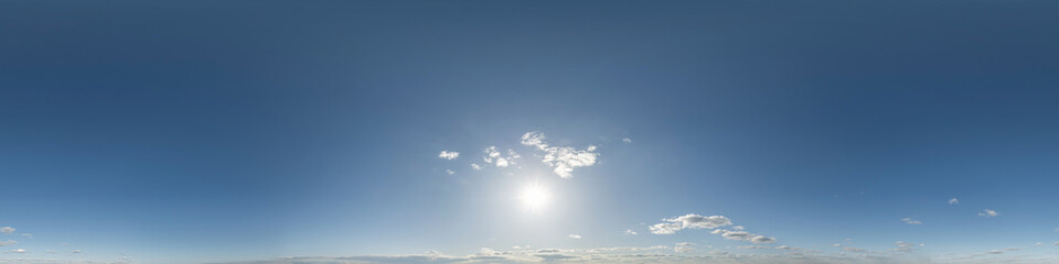 Wall Mural - clear blue skybox with clouds as seamless hdri 360 panorama with zenith in spherical equirectangular
