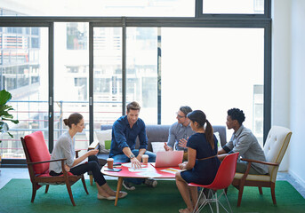 Business people, group and staff for collaboration, creativity and planning in modern office lounge. Startup, men or women in diversity brainstorming ideas for project, teamwork or meeting discussion