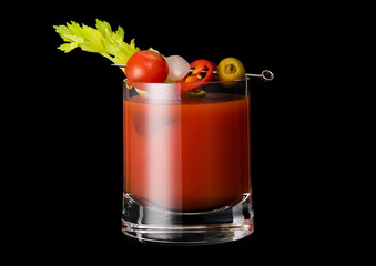 Fototapeta classic hot bloody mary cocktail mix with vodka and tomato juice on black background.