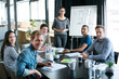 © Y.A./peopleimages.com - Presentation, chart and portrait with business people in meeting for statistics, planning and consulting. Training, speaker and conference with employees in office for workshop, growth and investment