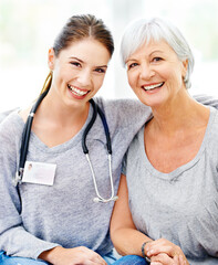 Wall Mural - Senior care, happiness and portrait of nurse with old woman in nursing home, help and support from healthcare. Retirement, caregiver service and elderly patient with healthy smile on face in lounge.