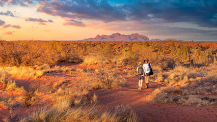 Northern Territory, Australia; June 10, 2023 - Hikers in the Australian outback admiring the spectacular landscape.