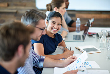 Poster - Portrait, happy and a business woman in the boardroom with her team during a meeting for planning. Smile, strategy or collaboration with a female employee and colleagues in the office for a workshop