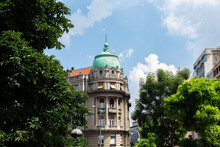 Part Of A Classical Building In Belgrade. A Building With A Rotunda On The Corner.
