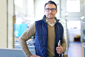 Poster - Delivery, manager and portrait of man in factory for manufacturing, networking and inventory. Distribution, industrial and technology with male employee in warehouse for inspection, export or storage