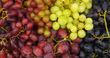 Five Kinds Of Fresh Grapes As Background