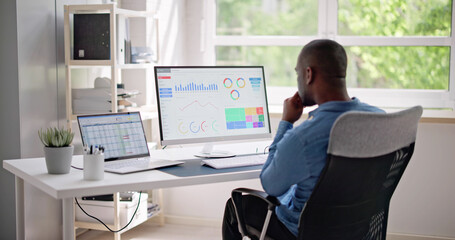 Poster - African Businessman Using Analytics Data KPI Dashboard