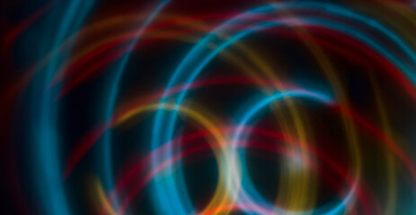 Wall Mural - abstract color light circle on black background