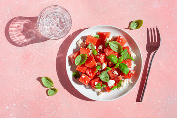 Wall Mural - watermelon salad with feta cheese and basil. healthy summer dessert