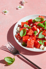 Wall Mural - watermelon salad with feta cheese and basil. healthy summer dessert