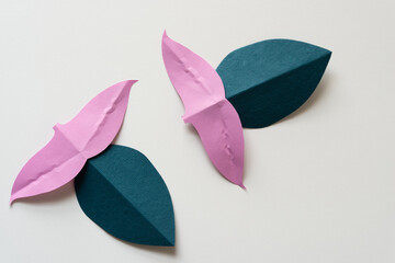 Canvas Print - pink and blue cut paper shapes on blank paper