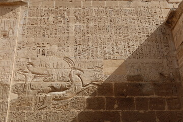 Wall Mural - Inscriptions on the walls of the mortuary temple of Medinet Habu in Luxor in Egypt