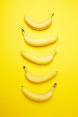 Wall Mural - Bananas on a yellow background