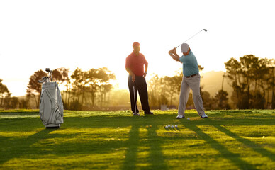 Morning, golf and men on a course for training, competition or professional game. Fitness, summer and friends on the grass golfing during retirement for holiday, hobby and recreation at a club