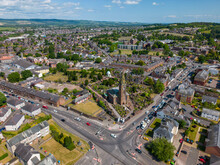 This Aerial Drone Photo Shows The Town Of Dumfries In The District Of Dumfries And Galloway In Scotland. You Can See A Beautiful Church With A Graveyard In A Residential Area. 