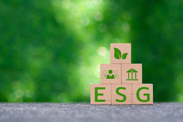 ESG concept of environmental, social and governance.words ESG on a wooden block. Idea for save world, sustainable organizational development. ​account the environment, society and corporate governance