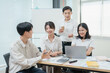 © Jirapong - startup Asian business advisor meeting to analyze and discuss the situation on the financial report in the meeting room.Investment Consultant, Financial , teamwork ,brainstorming and accounting