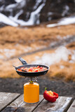 Fototapeta Pomosty - camping cooking in mountains, iceland