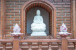 White Buddha statue in Hanoi, Vietnam, at the Tran Quoc Pagoda in West Lake (Tay Ho). Shallow focus for effect on the top of of the white statue's head.
