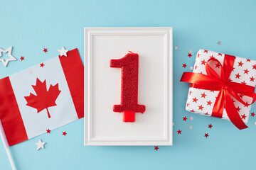 Wall Mural - Concept of a jubilant July 1st Celebration in Canada. Top view flat lay of national flag, gift box, star-shaped confetti on light blue background and frame with numeral 1 candle