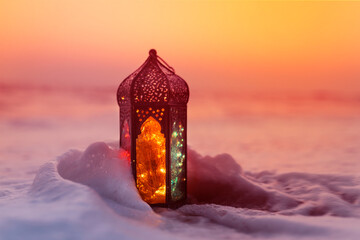 Beautiful Ramadan concept photo, Traditional Lantern lamp on the beach with ocean waves, 2024 Eid Mubarak background