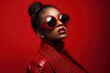 © iridescentstreet - High fashion studio portrait of young african american woman with red sunglasses, beautiful makeup, luxury style. Generative AI