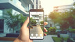 © wetzkaz - mobile phone display screen, hand holds a phone and controls his smart home from outside