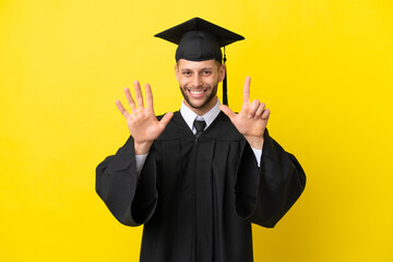 Wall Mural - Young university graduate caucasian man isolated on yellow background counting seven with fingers