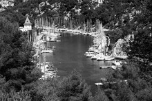 View Of Sailing Boats Mooring In Marina Of Calanque De Port-Miou. Calanques National Park, Cassis, France. Travel In Nature, Recreation And Leisure, Water Sports. Black White Historic Photo