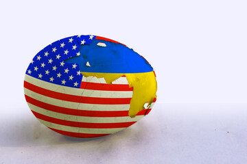 Chicken egg with the texture of the US flag. Chicken protein with the texture of the flag of Ukraine. The concept of support and protection of Ukraine by America.