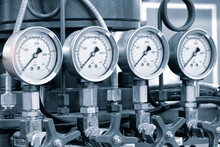 Industrial  Concept. Equipment Of The Boiler-house, - Valves, Tubes, Pressure Gauges, Thermometer. Close Up Of Manometer, Pipe, Flow Meter, Water Pumps And Valves Of Heating System In A Boiler Room.