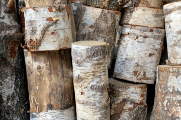 Poster - Background of stacked chopped wood logs. Pile of wood logs ready for winter. Wooden stumps, firewood stacked in heap