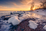 Fototapeta Zachód słońca - Sunset over the ocean horizon