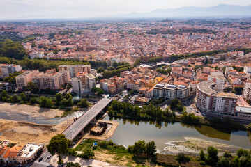 Wall Mural - Panoramic view of Perpignan city center and Tet river on sunny day, France