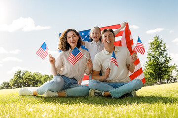 Patriotic holiday, family with American flag