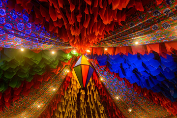 Colorful flags and a balloon, decoration for the Saint John  festival, which takes place in June in the Northeast of Brazil.