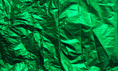 Poster - Wrinkled green plastic wrap texture for background. abstract paper foil wallpaper