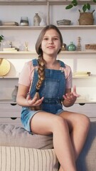 vertical video. child blog. online stream. confident happy emotional smiling smart girl talking gest