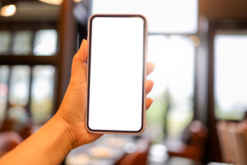 Women's hands holding cell telephone blank copy space screen. smartphone with blank white screen isolated on white background . smart phone with technology concept