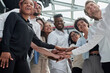 © Katsiaryna - A Group of International Business People Are Putting Their Hands Together